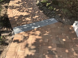 chambersburg brown tan clay brick paver with bluestone step edge herringbone pattern beveled chamfered edge